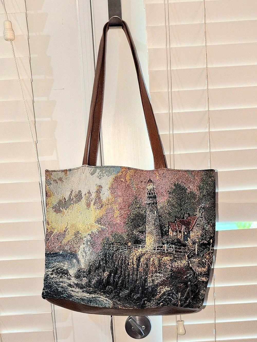 Thonas Kinkade Tapestry Print And Brown Vegan Leather Tote.